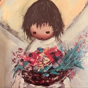 Two Ted DeGrazia art pieces entitled THE FLOWER BOY and THE FLOWER GIRL
